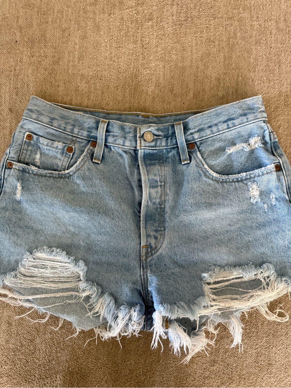 Levi’s Light Blue Distressed Denim Shorts